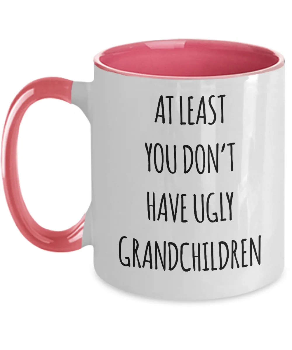 To Grandma At Least You Don't Have Ugly Grandchildren Two-Tone Mug Coffee Cup Funny Gift