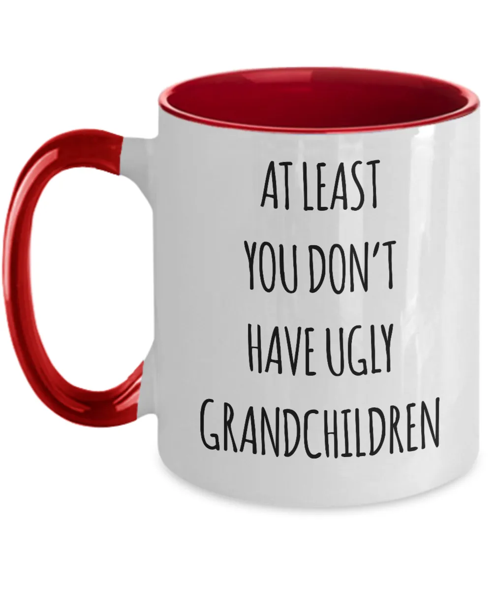 To Grandma At Least You Don't Have Ugly Grandchildren Two-Tone Mug Coffee Cup Funny Gift