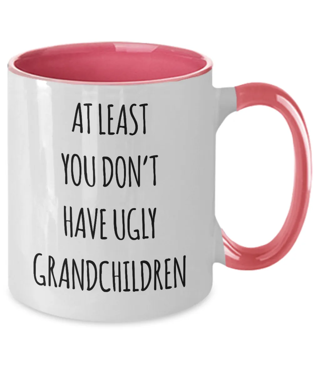 To Grandma At Least You Don't Have Ugly Grandchildren Two-Tone Mug Coffee Cup Funny Gift